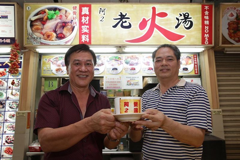 Franchise owners Ma Pit San (left) and Nong Gan standing in front of hawker stall Ah Er Soup at ABC Brickworks Market in Singapore June 22, 2017. u00e2u20acu201d TODAY pic