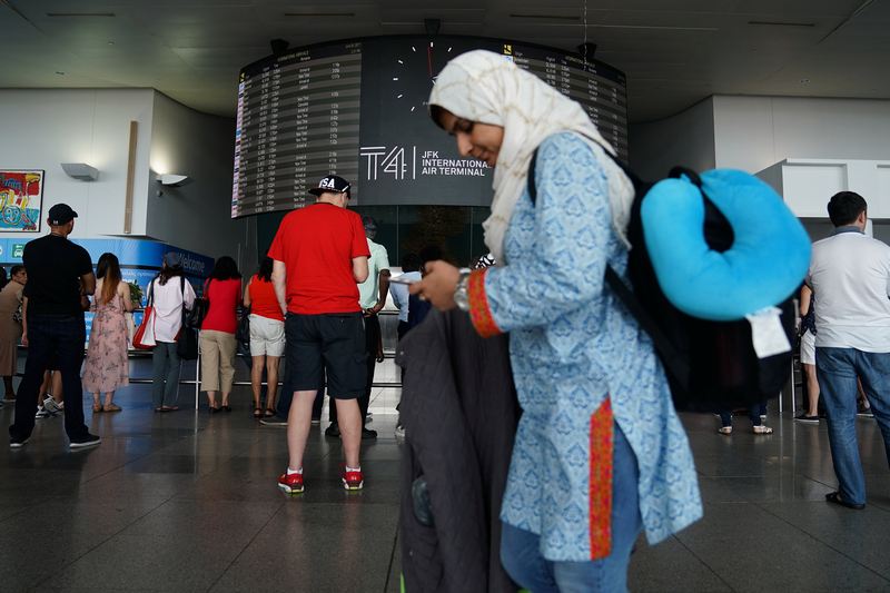 People wait for flights in advance of the incoming travel ban to the US at John F Kennedy airport in New York  June 29, 2017. u00e2u20acu201d Reuters pic 
