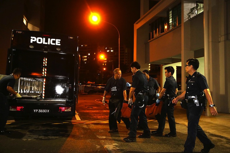 The bodies of the elderly couple were brought down for their home at around 11.15pm on Wednesday.u00c2u00a0u00e2u20acu201du00c2u00a0Picture by Wee Teck Hian/TODAY