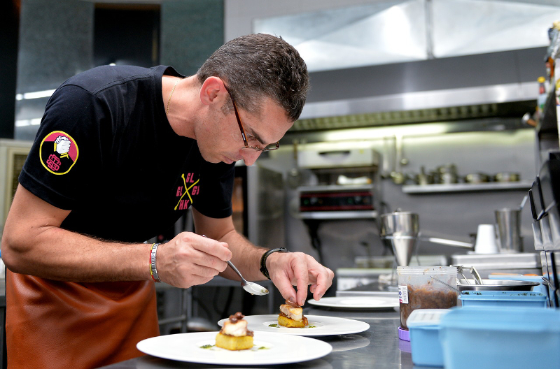 Michelin star chef Vincent Lucas works on a dish at Garvy’s French Fine Dining In The Park Restaurant in Ipoh June 7, 2017.
