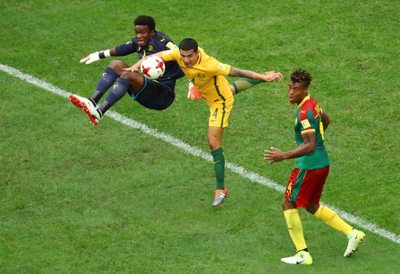 Cameroonu00e2u20acu2122s Fabrice Ondoa and Adolphe Teikeu in Confederations Cup football action with Australiau00e2u20acu2122s Tim Cahill (centre) in Saint Petersburg June 22, 2017. u00e2u20acu201d Reuters pic
