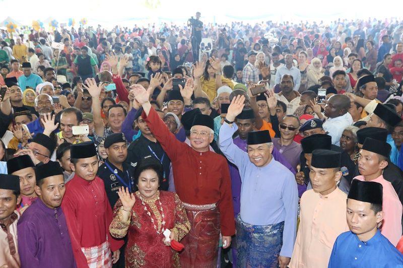 Datuk Seri Najib Razak ,Datin Seri Rosmah and Datuk Seti Zaid Hamidi posing for photographs with visitors during the Aidilfitri open house held in Seri Perdana, Putrajaya, June 25, 2017. u00e2u20acu201d Picture by Choo Choy May