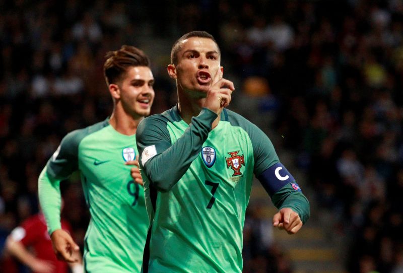 Portugalu00e2u20acu2122s Cristiano Ronaldo celebrates scoring the first goal against Latvia. u00e2u20acu2022 Reuters pic