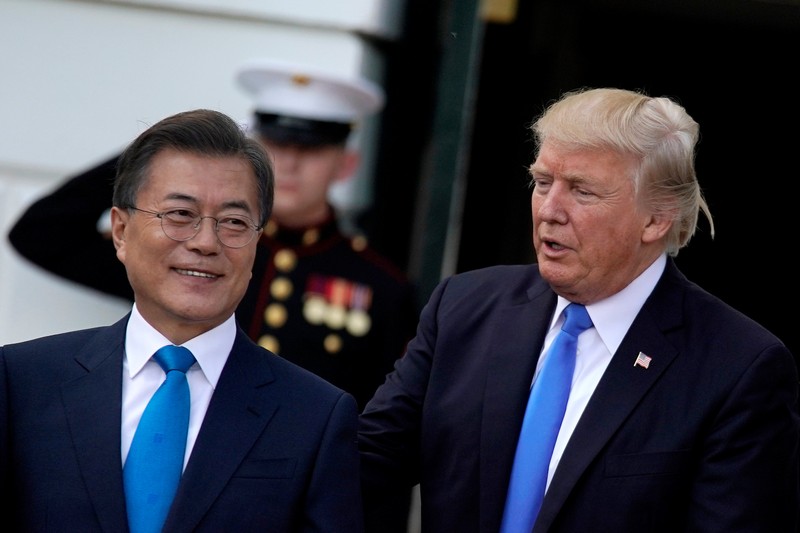 US President Donald Trump (right) welcomes South Korean President Moon Jae-in to the White House in Washington June 29, 2017. u00e2u20acu201d Reuters pic