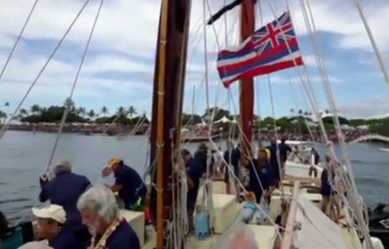Image of the canoe Hokulea sailing into Hawaii after its round-the-world trip from the Reuters video.n