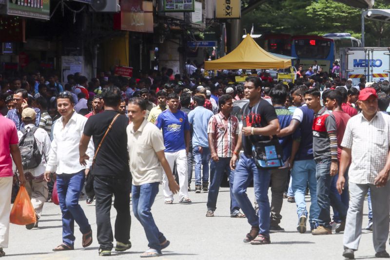 Foreign workers throng Kotaraya, Kuala Lumpur during the Raya holidays on June 26, 2017. u00e2u20acu201d Picture by Choo Choy Maynn