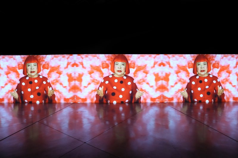 'Song of a Manhattan Suicide Addict' (1999) is a video performance... the artist herself in her signature red wig and polka dotted dress.