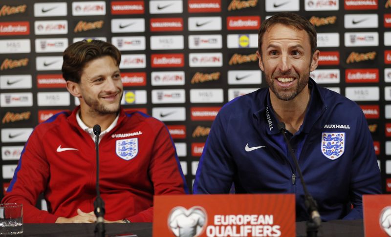 England manager Gareth Southgate with Adam Lallana during a press conference at Hampden Park in Glasgow. u00e2u20acu2022 Reuters pic