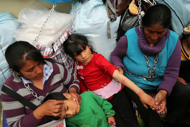 Residents of the town Cerro de Pasco in the Peruvian Andes show skin rash in their children's hands, as they protest outside of the health ministry in Lima, Peru June 22, 2017. u00e2u20acu201d Reuters pic 