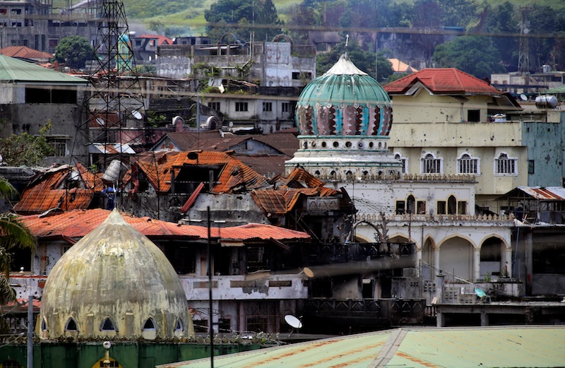 Damaged buildings and houses are seen as government forces continue their assault against insurgents from the Maute group, who have taken over large parts of the Marawi City, Philippines June 22, 2017.u00c2u00a0u00e2u20acu201d Reuters pic
