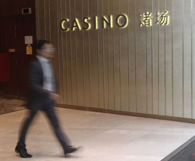 A man walks past the Marina Bay Sands Casino entrance. u00e2u20acu2022 TODAY pic