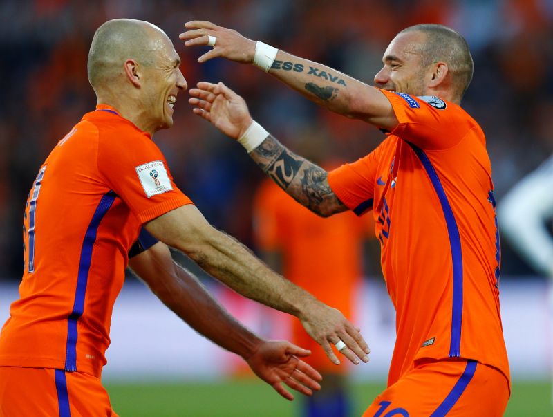 Netherlandsu00e2u20acu2122 Wesley Sneijder and Arjen Robben celebrate a goal against Luxembourg. u00e2u20acu2022 Reuters pic