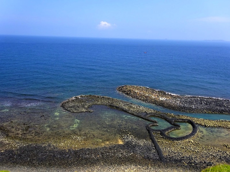 One sight that tourists love is the twin heart stone weir in Qimei islet. u00e2u20acu201d Picture by Mavis Teo