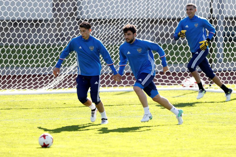 Russia's Ilya Kutepov and Georgi Dzhikiya during a training at Smena Stadium in Saint Petersburg. u00e2u20acu2022 Reuters pic