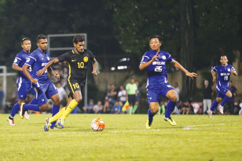 S. Kumaahran in action for the national Under-22 side when they held Felda 1-1 on Tuesday. u00e2u20acu201d Picture by Ahmad Zamzahuri