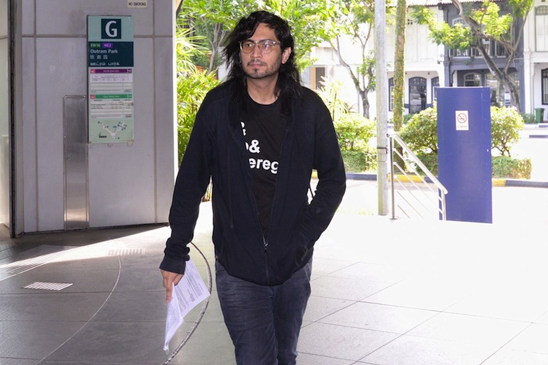 Sean Francis Han, one of the individuals who participated in the protest on board a MRT train, arriving at the Police Cantonment Complex for questioning, on June 12, 2017. u00e2u20acu201d Picture by Robin Choo/TODAY