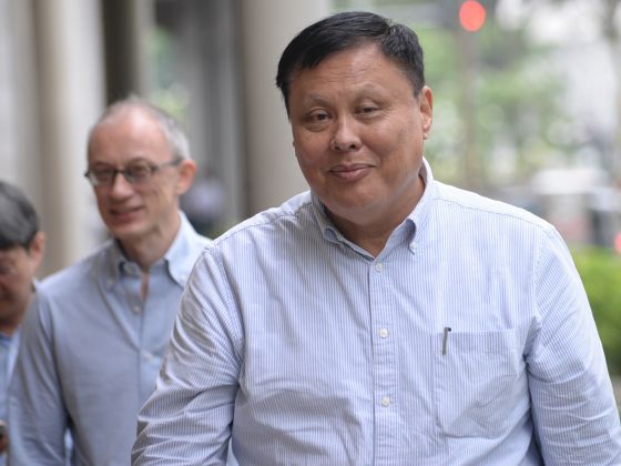 Michael Vaz Lorrain (right), Singapore Gun Club president, leaving the Supreme Court on June 22, 2017. u00e2u20acu201d Picture by Robin Choo/TODAY