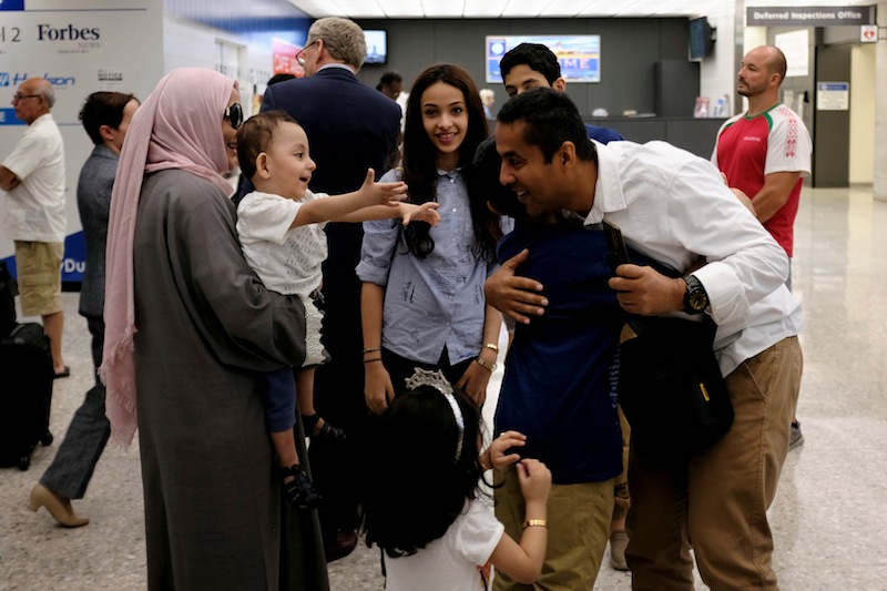 A Saudi family embraces each other as members arrive at Washington Dulles International Airport  in Dulles, Virginia, June 26, 2017. u00c2u00a0u00e2u20acu201d Reuters picn 