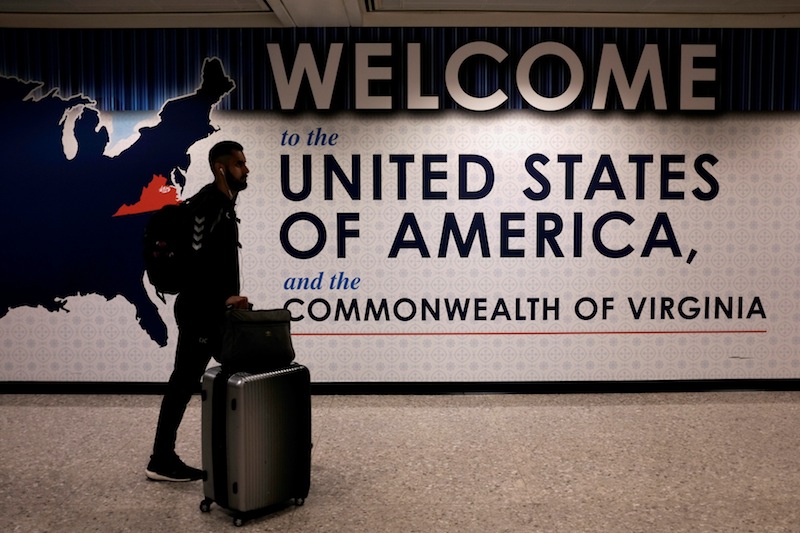 An international passenger arrives at Washington Dulles International Airport in Dulles, Virginia, June 26, 2017. u00e2u20acu201d Reuters pic 