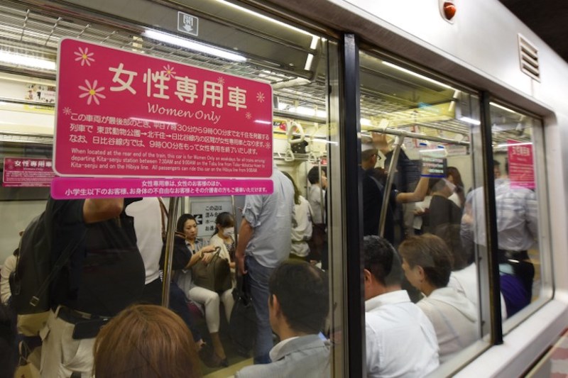 A poster informing commuters of a womenu00e2u20acu2122s-only carriage is displayed on a subway train in Tokyo June 2, 2017. u00e2u20acu201d AFP pic