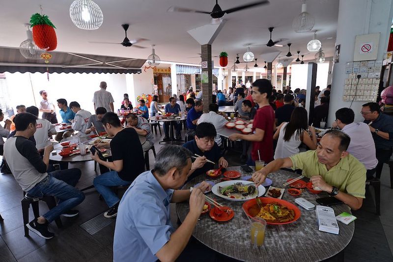 Ong Cheng Kee, the owner of Zai Shun Curry Fish Head, said he served about 50 more customers during lunchtime a day after the Bib Gourmand announcement on June 23, 2017. u00e2u20acu201d TODAY pic