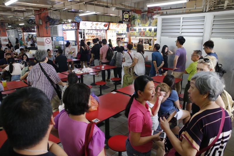 The queue at the HK Soya Chicken stall at Chinatown Block 335 Smith Street. u00e2u20acu201d Picture by Najeer Yusof/ TODAY
