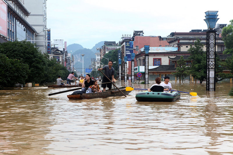 People make their way with boats through au00c2u00a0flooded area in Liuzhou, Guangxi province July 2, 2017.u00c2u00a0u00e2u20acu201d Reuters pic