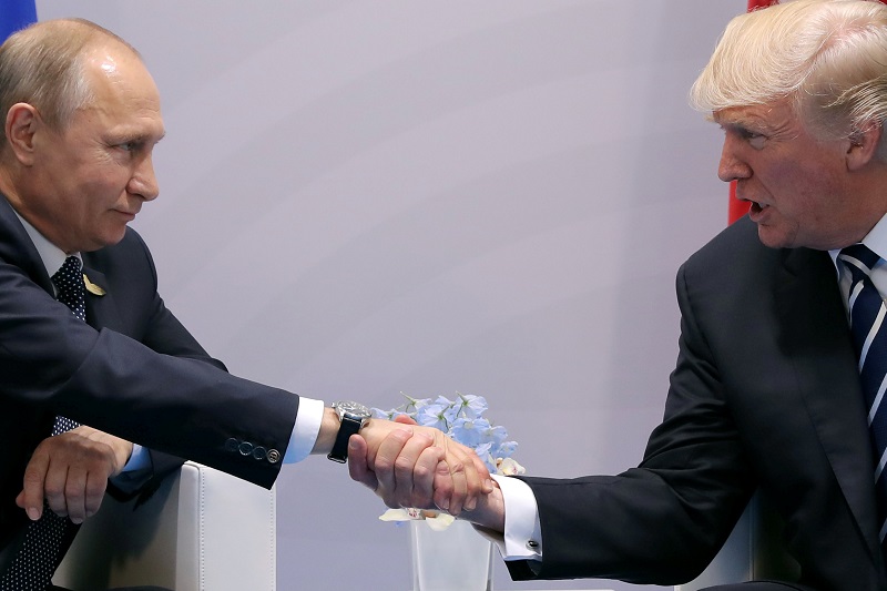 US President Donald Trump shakes hands with Russian President Vladimir Putin during their bilateral meeting at the G20 summit in Hamburg July 7, 2017. u00e2u20acu201d Reuters pic