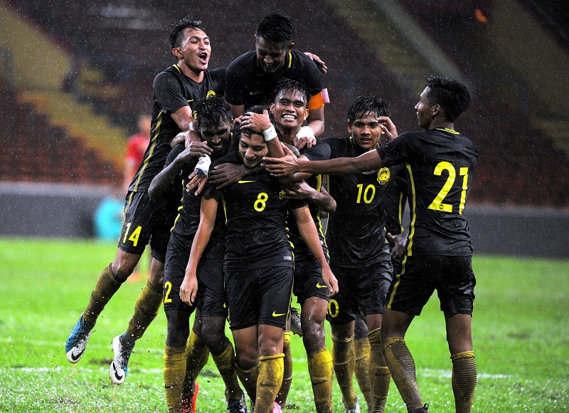The Malaysian Under-22 team celebrate after scoring during their match against the Myanmar U-22 squad in Shah Alam July 13, 2017. u00e2u20acu201d Bernama pic