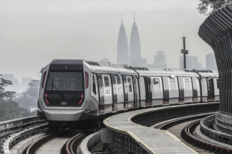 A train from Malaysiau00e2u20acu2122s first MRT line which runs from Sungai Buloh to Kajang, with the Petronas Twin Towers in the background. u00e2u20acu201d Picture by Yusof Mat Isa