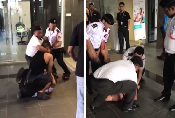 Screen captures of a video showing the scuffle between the security guards and the MMA fighter. u00e2u20acu2022 Picture via Facebook/Discover Subang Jaya