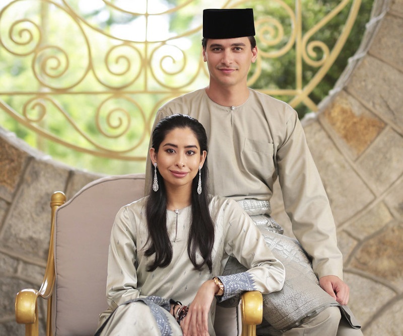 Tunku Tun Aminah Maimunah Iskandariah Sultan Ibrahim and Dennis Muhammad Abdullah pose in an official photograph that was released July 23, 2017, ahead of their wedding on August 14, 2017. u00e2u20acu201d Bernama pic