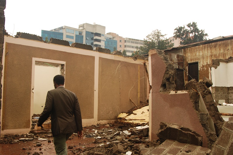 Ababaker examines the remains of his family home in Piassa, Addis Ababa July 8 2017. u00e2u20acu201d Thomson Reuters Foundation pic