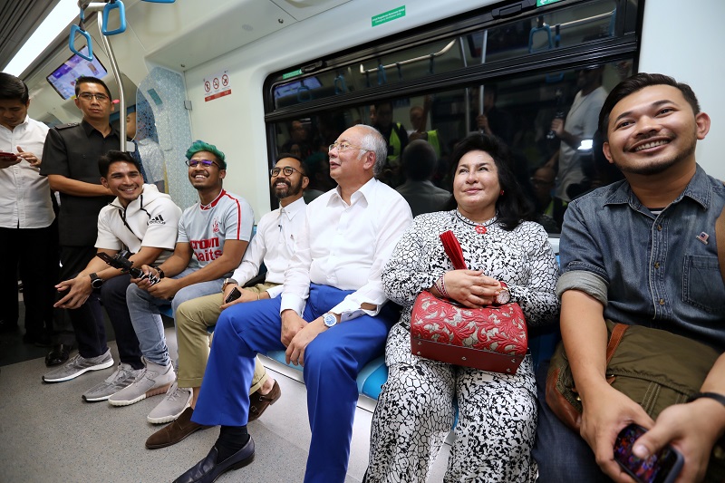 Prime Minister Datuk Seri Najib Razak and his wife Datin Seri Rosmah Mansor take a ride on the MRT from Pusat Bandar Damansara to KL Sentral in Kuala Lumpur. Picture released July 13, 2017. u00e2u20acu201d Bernama pic