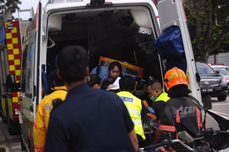 The SCDF responding to the chemical leak at 166 Kallang Way. u00e2u20acu201d Picture by Jason Quah