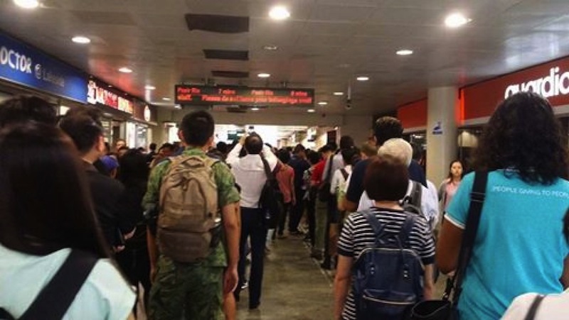Commuters travelling to work on the North-South and East-West Lines (NSEWL) experienced delays due to an intermittent power fault this morning. u00e2u20acu201d Picture by Lovelle Tan