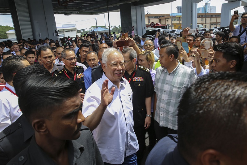 Prime Minister Datuk Seri Najib Razak Razak waves at the crowd during the second phase launch ceremony of the MRT Sungai Buloh - Kajang line in Kuala Lumpur July 17, 2017. u00e2u20acu201d Picture by Yusof Mat Isa