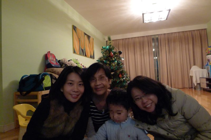 The child is shown with Cheng and other family members before his second abduction in 2013. 