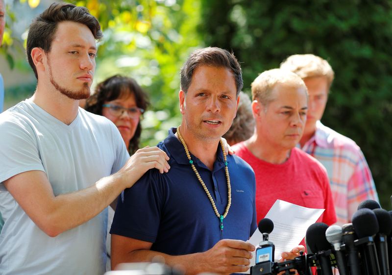 Don Damond is comforted by his son Zach Damond as he speaks about his fiance, Justine Damond, who was fatally shot by Minneapolis police in Minneapolis July 17, 2017. u00e2u20acu201d Reuters pic