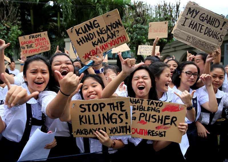 Catholic students gesture while holding placards denouncing the numerous killings under President Rodrigo Duterte's war on drugs during a protest in Metro Manila July 18, 2017. u00e2u20acu201d Reuters pic
