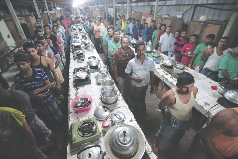 51 illegal workers in their living quarters were arrested in Meru, Klang, after Immigration officers raided two locations following the E-Kad deadline. u00e2u20acu201d Picture by Azinuddin Ghazali
