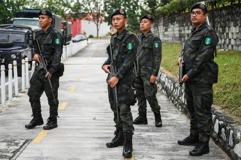 General Operations Force policemen arrive to provide security during the court appearance of Siti Aisyah and Doan Thi Huong at the Shah Alam High Court in Shah Alam June 28, 2017. u00e2u20acu2022 AFP pic