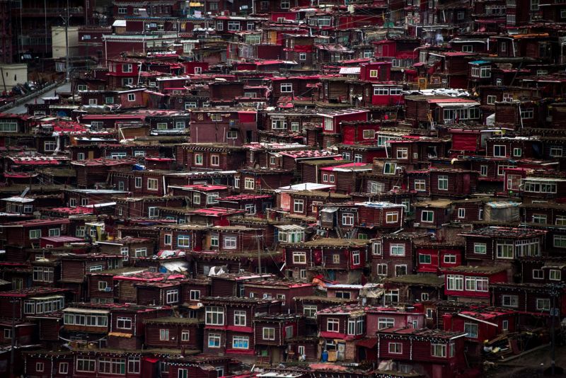 This picture taken on May 29, 2017 shows partially demolished houses at the Larung Gar Buddhist Institute in Sertar county in southwest Chinau00e2u20acu2122s Sichuan province. u00e2u20acu2022 AFP pic