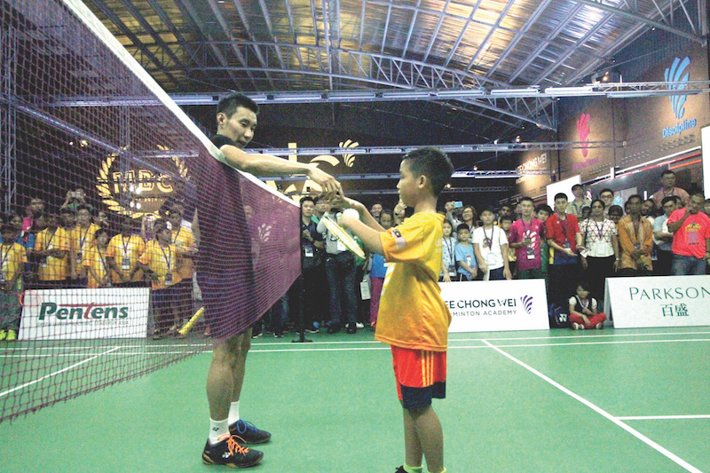 Pak Lam (right) got to play against his idol. u00e2u20acu201d Picture by Farhan Najib