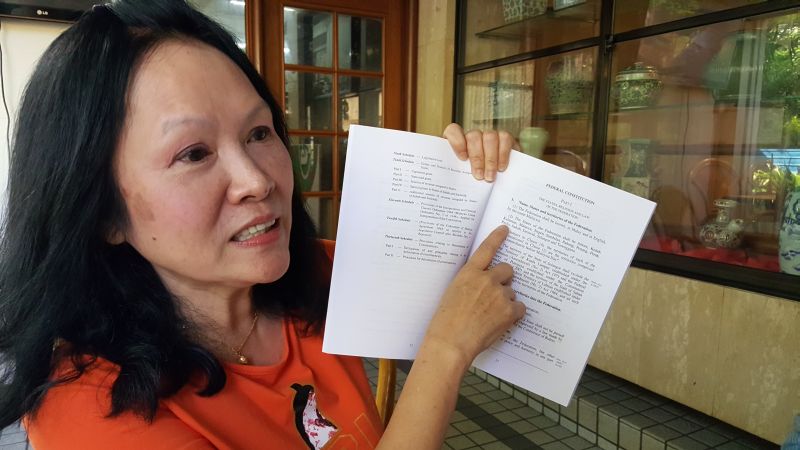 Rights activist Lina Soo explaining to reporters on the implication of amending Article 1(2) of the Federal Constitution that reduced Sarawak's status as one equal partner to Malaya to one of the 13 states in the Federation of Malaysia, July 18, 2017. u00e2u20acu2022