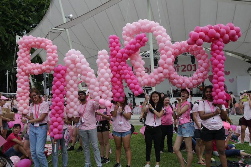 Attendees of Pink Dot 2017 hold up a balloon banner. u00e2u20acu201d TODAY pic