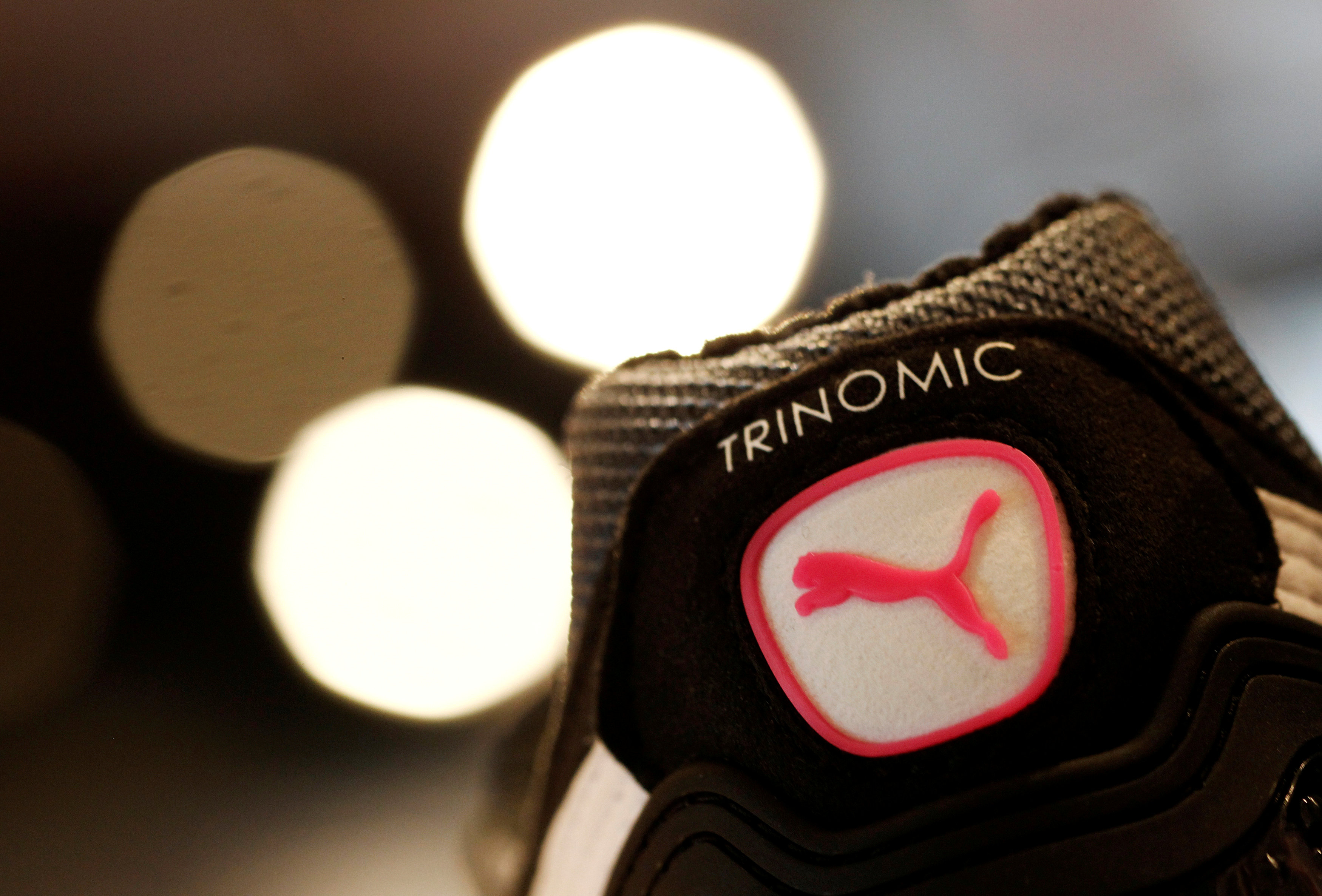 The logo of German sports goods firm Puma is seen on a shoe after the companyu00e2u20acu2122s annual news conference in Herzogenaurach February 20, 2014. u00e2u20acu201d Reuters pic