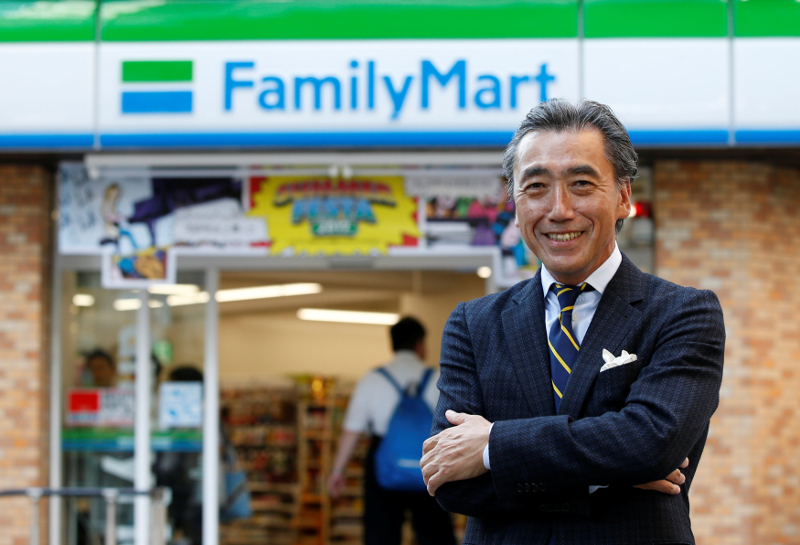 FamilyMart Cou00e2u20acu2122s President Takashi Sawada poses for a photo in front of a FamilyMart convenience store after an interview with Reuters in Tokyo July 21, 2017. u00e2u20acu201d Reuters pic