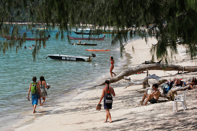 Tourists enjoy on a beach at the island of Koh Tao, Surat Thani Province September 19, 2014. u00e2u20acu201d Reuters pic