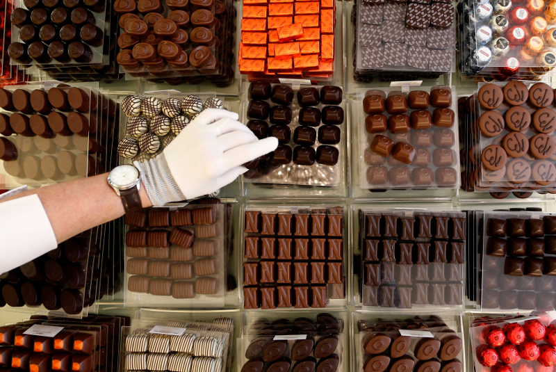 A vendor selects pralines at Belgian chocolate shop Neuhaus inside the Galeries Royales Saint-Hubert in central Brussels July 17, 2017. u00e2u20acu201d Reuters pic